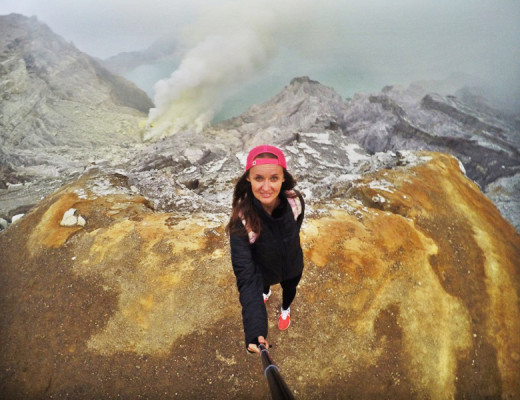 Kawah Ijen volcano, The One Who Wanders overlooking the lake which is one of the most acidic lakes in the world